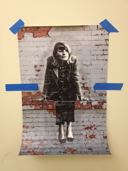 Photo of placed strips of masking tape on each side of a Wall Peel, 10 to 12 inches down from the top